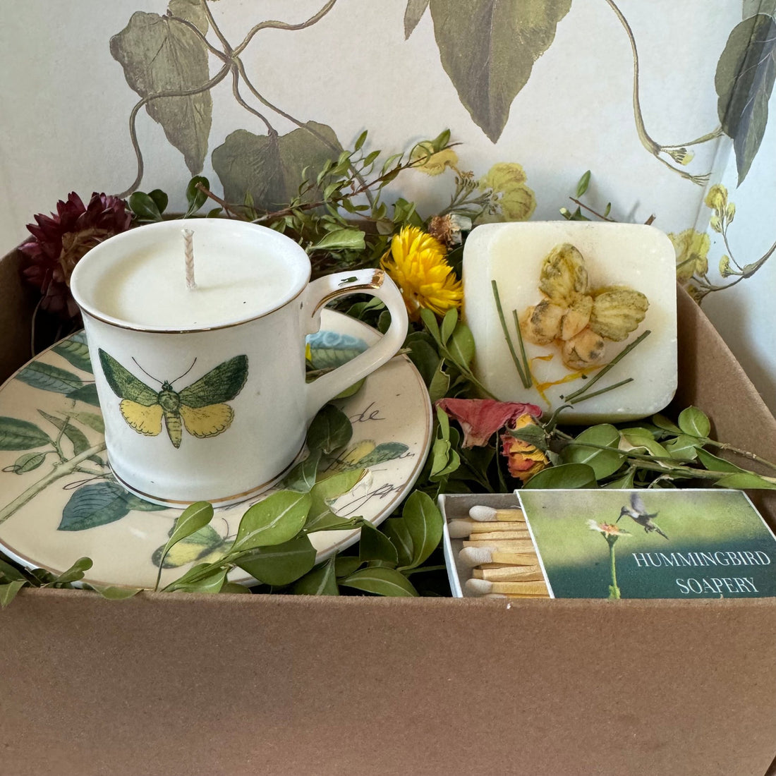 gift box , cup and saucer soy candle  with butterflies painted on ceramics, all natural soap with essential oils, botanicals and dried flowers